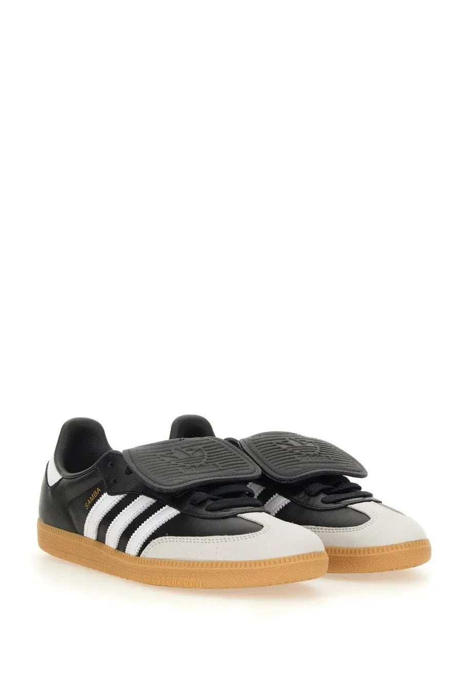 Adidas unisex samba lt sneaker black in black and white with a gum rubber sole for casual wear