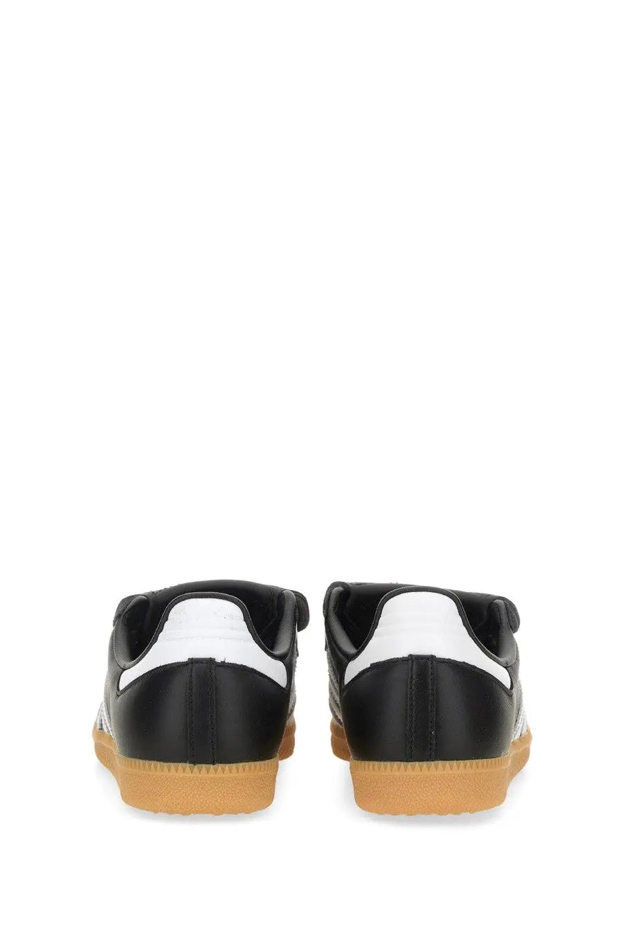 Adidas unisex samba lt sneaker in black with white stripes and gum rubber sole for casual wear