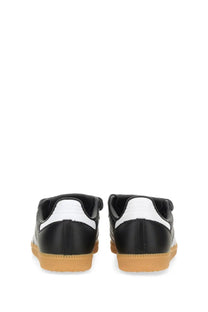 Adidas unisex samba lt sneaker in black with white stripes and gum rubber sole for casual wear