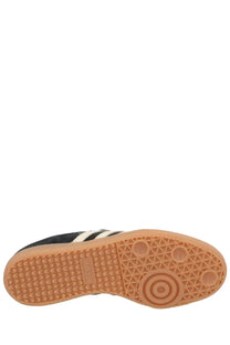 Black adidas unisex samba og sneaker with white stripes and tan rubber sole made of suede and leather