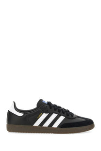 Black adidas unisex samba sneaker with white three stripes black laces and brown rubber sole for casual wear