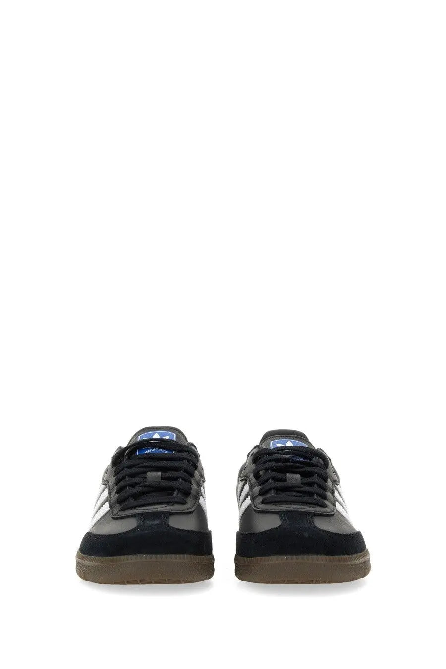 Adidas unisex samba sneaker black in black and white with gum rubber sole designed for casual and athletic wear