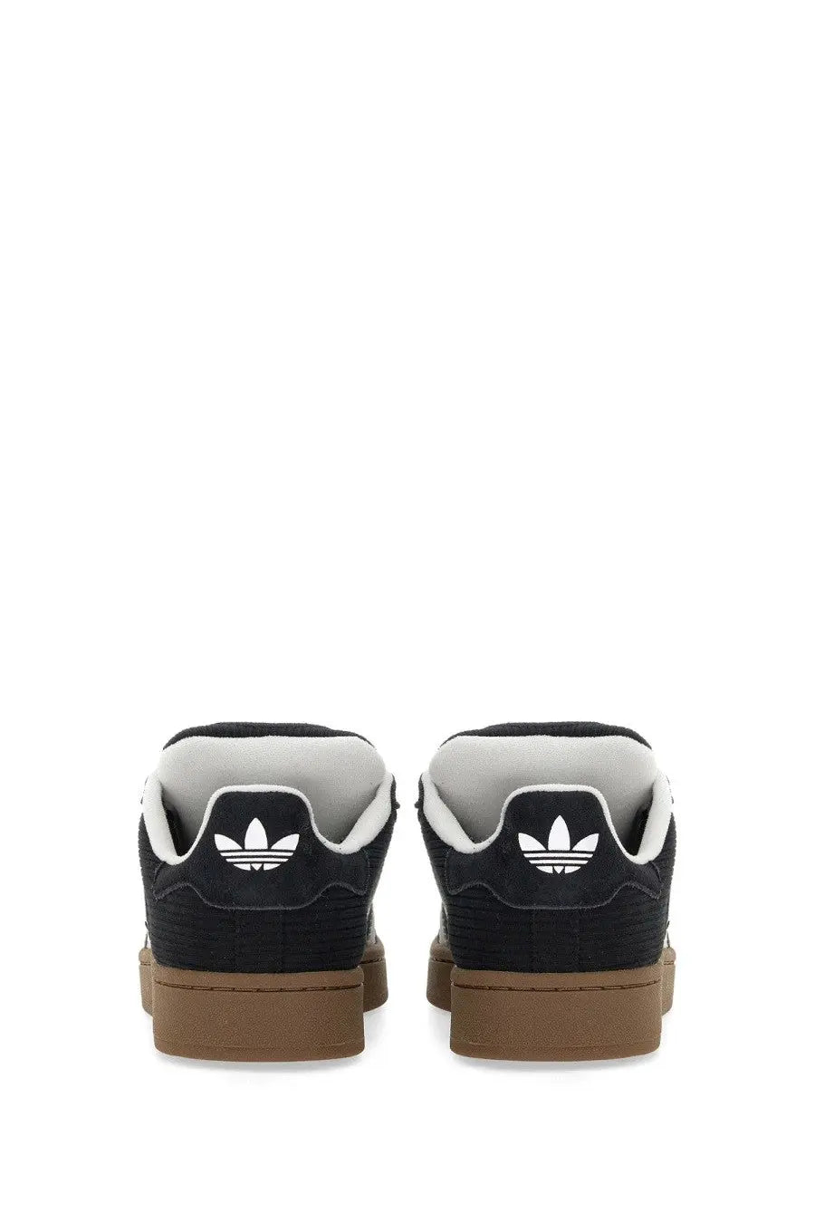 Black adidas unisex sneaker campus 00s with white logo and tan rubber soles showing the back side of the shoe