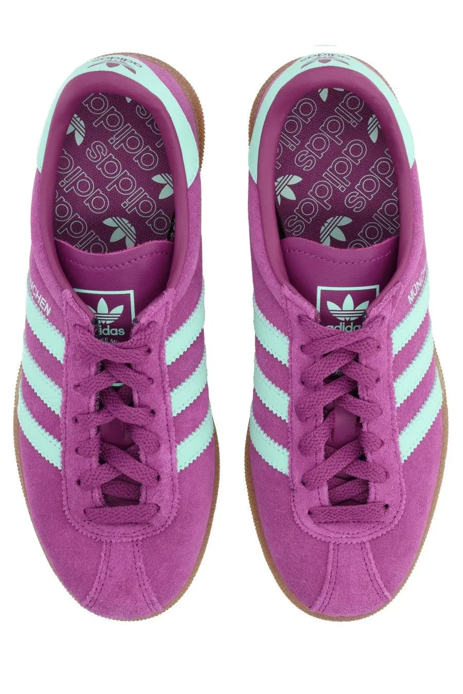 Adidas unisex sneaker muenchen purple featuring purple suede upper, mint green stripes, and gum rubber sole
