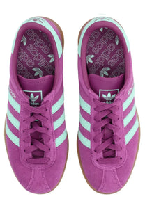 Adidas unisex sneaker muenchen purple featuring purple suede upper, mint green stripes, and gum rubber sole