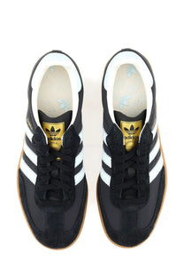 Adidas unisex sneaker Samba Black with black suede upper white stripes gold branding and gum rubber sole