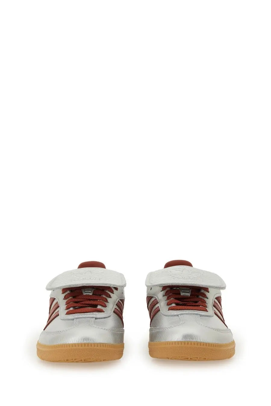 Silver adidas unisex sneaker samba with maroon laces and stripes, glossy finish, and gum rubber soles