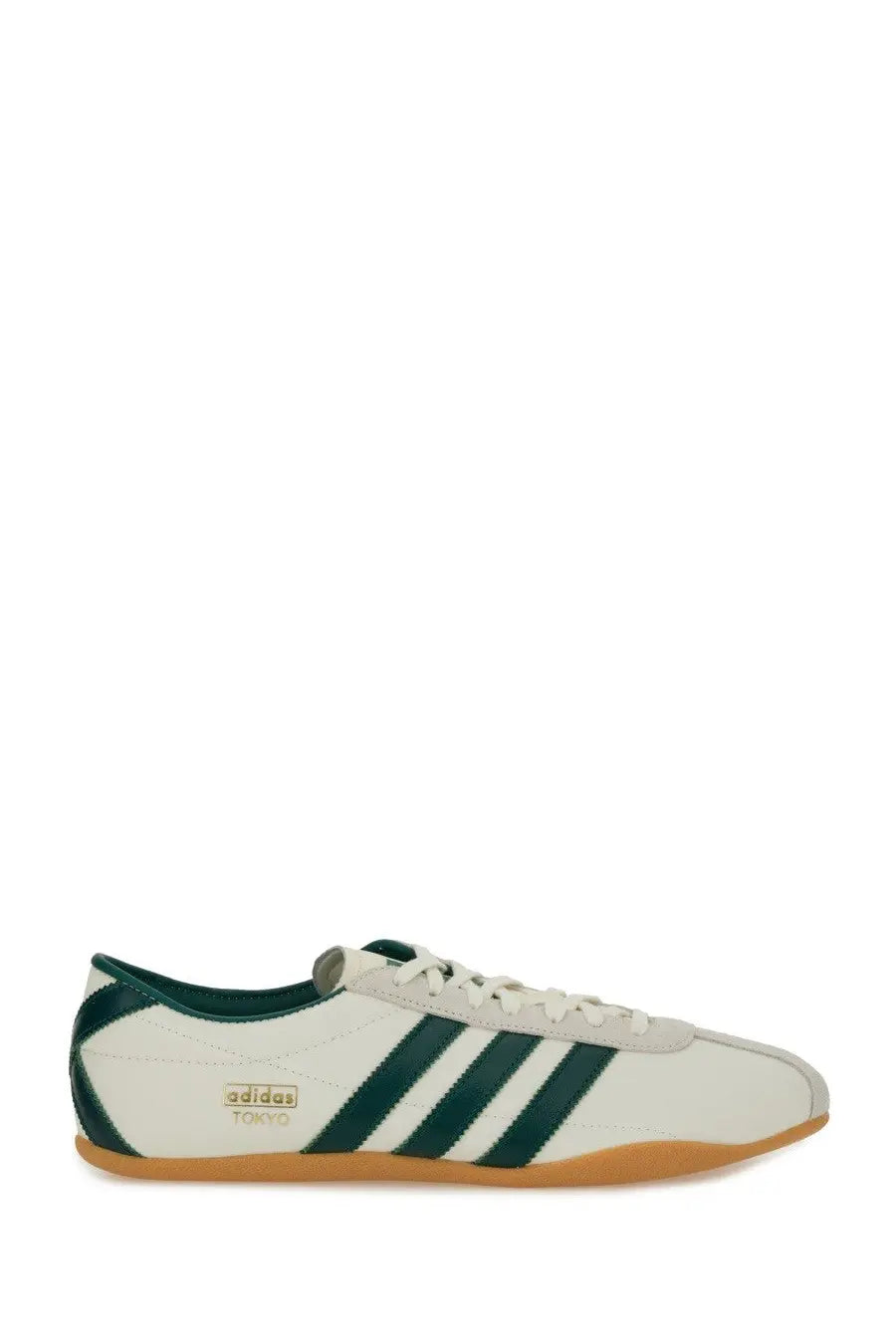 Adidas unisex sneaker tokyo white with dark green stripes and tan rubber sole in a sporty casual design