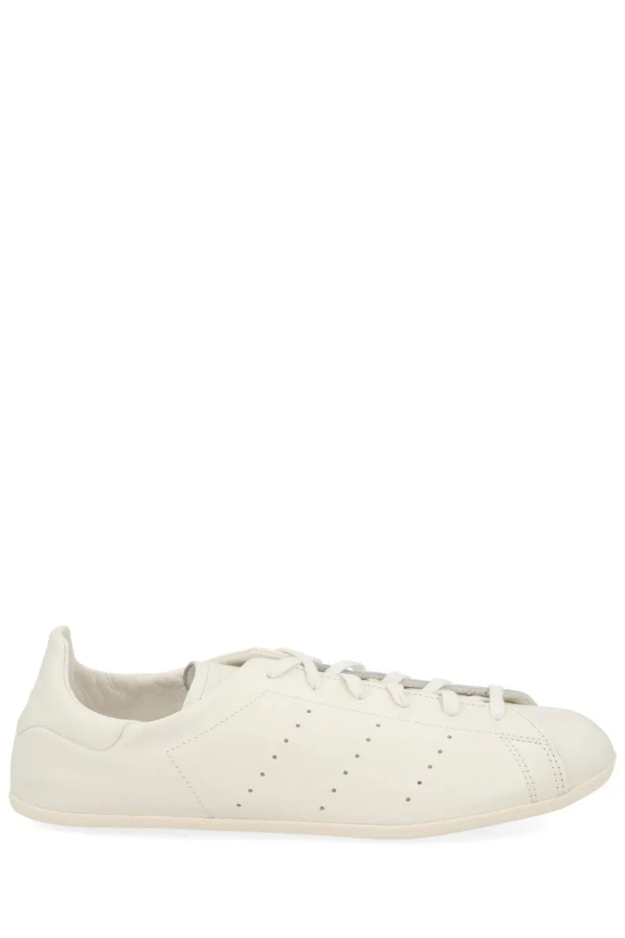 Adidas unisex stan smith lo pro sneaker in white leather with perforated side panels and matching laces