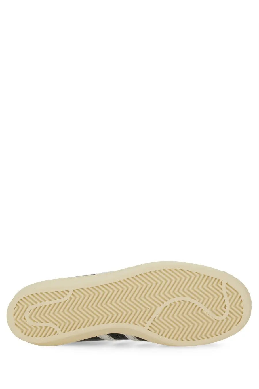 Adidas unisex superstar vintage sneaker black with cream-colored rubber sole featuring herringbone tread and three black stripes