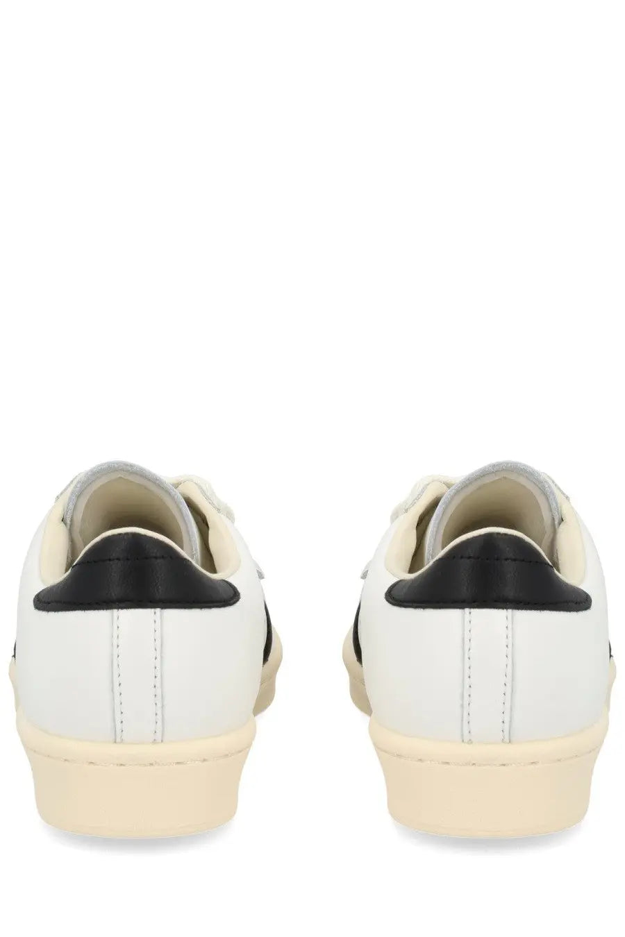 Adidas unisex superstar vintage sneaker white with white leather upper black heel tabs and cream-colored soles back view