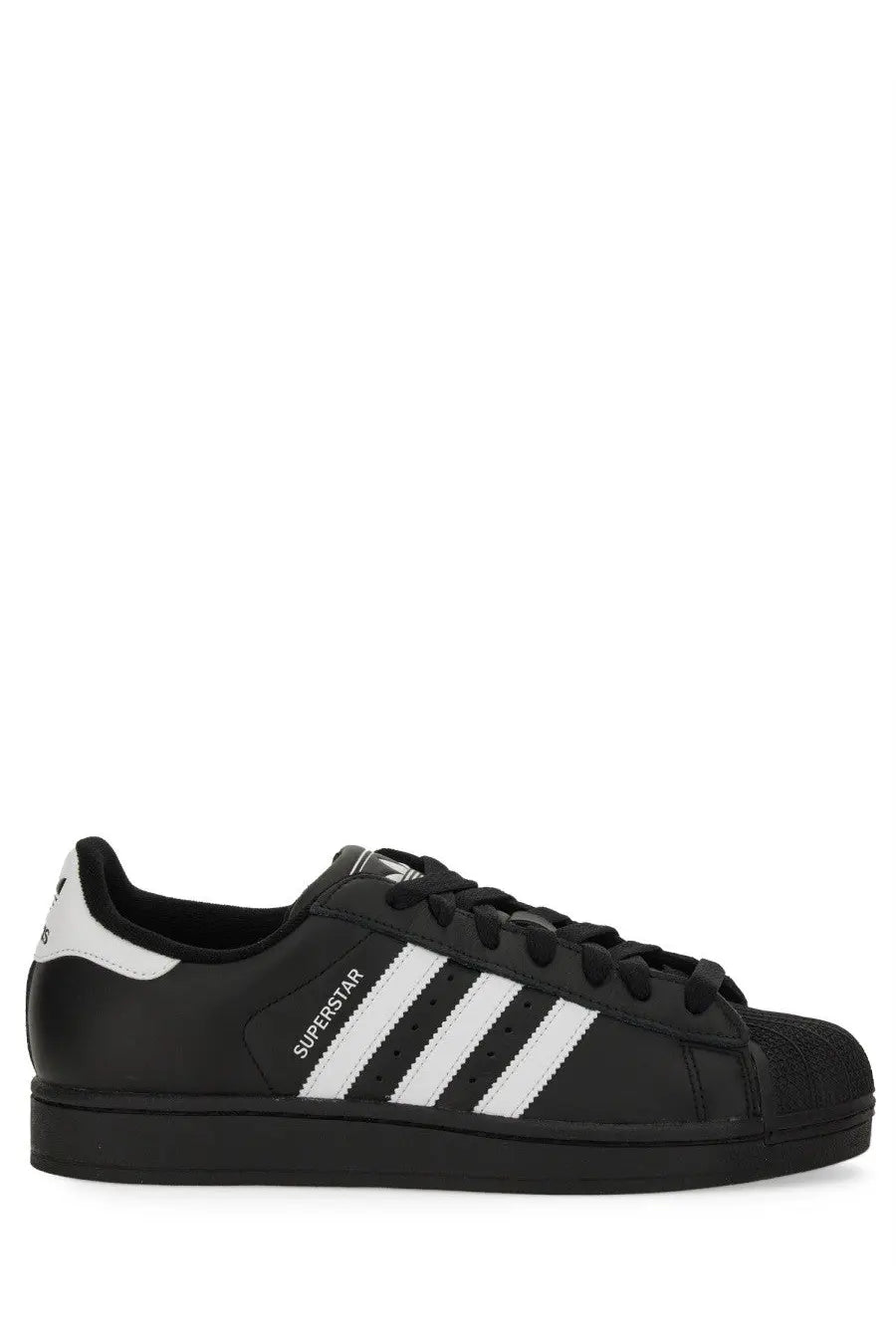 Black adidas unisex superstar sneaker with white three stripes and matching rubber toe cap