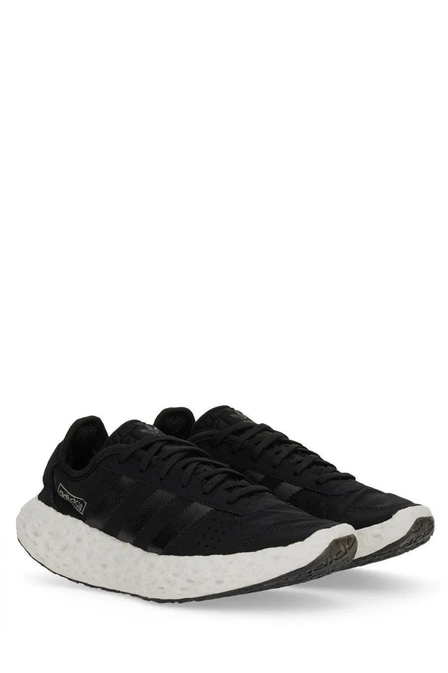 Adidas unisex zpong sneaker black with textured upper and white boost midsole designed for comfort and style