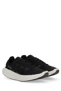 Adidas unisex zpong sneaker black with textured upper and white boost midsole designed for comfort and style