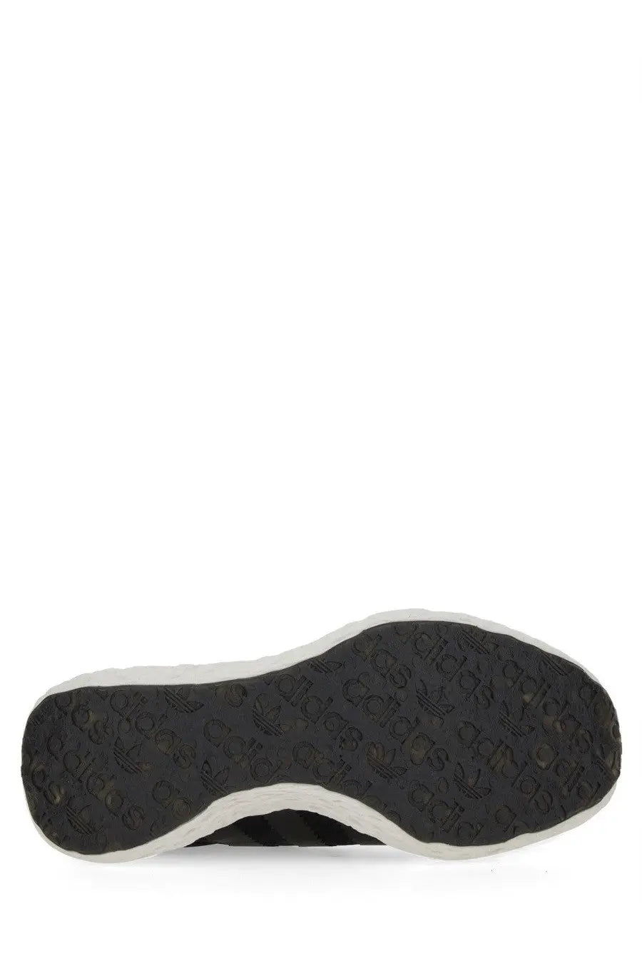 Adidas unisex zponge sneaker black with white rubber sole and repeating brand logo pattern on the outsole