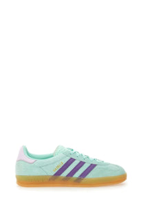 Adidas women’s gazelle indoor sneaker in mint green suede with purple stripes and translucent orange sole