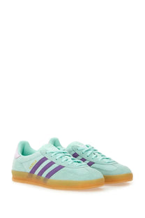 Adidas women’s gazelle indoor sneaker in mint green suede with purple stripes and gum rubber sole