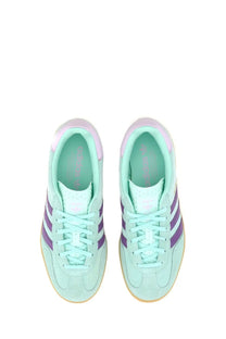 Adidas women’s gazelle indoor sneaker in mint green suede with purple stripes and light pink heel tab