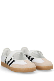 Adidas women’s samba jane sneaker white in white and beige suede with black stripes front view