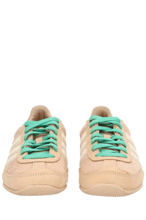 Adidas women’s sneaker japan warsan beige in beige suede with vibrant teal laces and classic three-stripe detailing