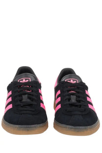 Adidas women’s sneaker muenchen black suede with vibrant pink stripes and gum rubber sole