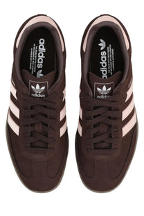 Adidas women’s sneaker samba brown brown suede with three white stripes and light pink heel tab shown from back