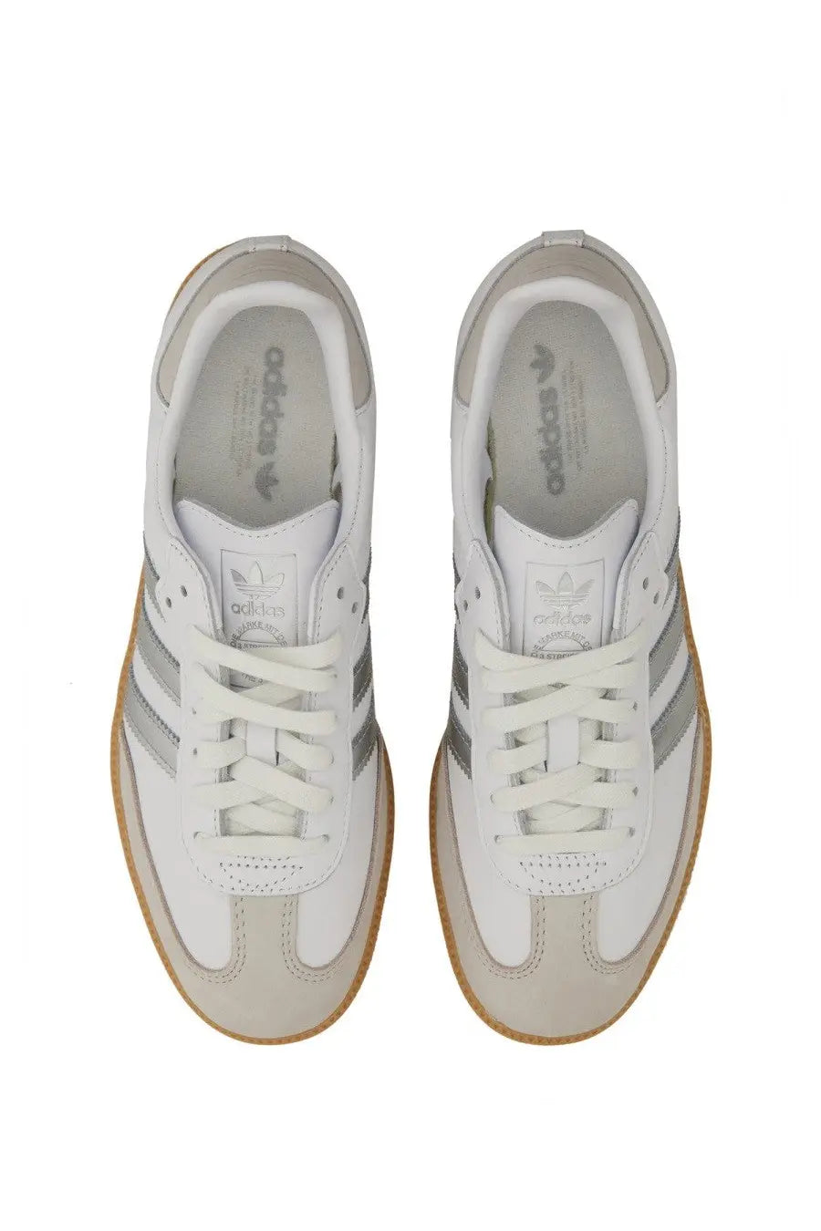 Adidas women’s sneaker Samba white with silver stripes and gum rubber soles in a classic low-top design