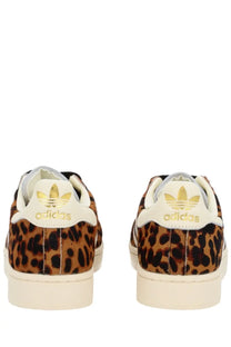 Adidas women’s superstar ii sneaker in leopard print with cream soles and gold-trimmed branding