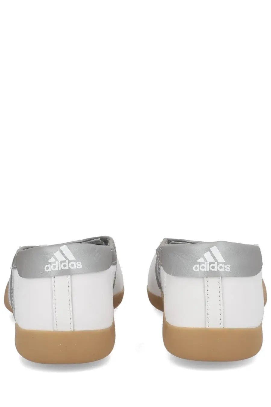 White and gray adidas women’s taekwondo mei sneaker with a gum-colored rubber sole for martial arts training