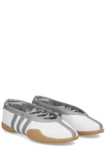 Adidas women’s Taekwondo Mei sneaker in white and gray with three stripes smooth leather upper and tan rubber sole