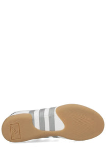 White and silver adidas womens taekwondo mei sneaker with three stripes on the side