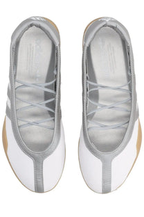 Adidas women’s taekwondo mei sneaker white in white and silver with a sleek lace up design for martial arts training