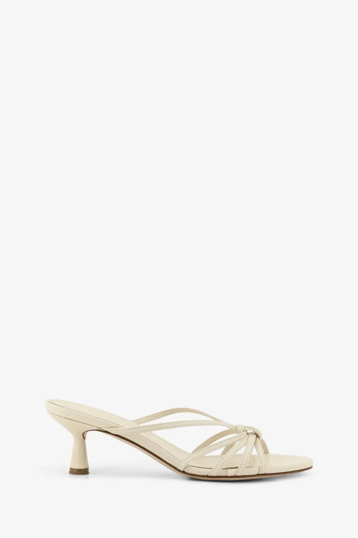 Aeyde women’s Abby cream-colored leather mule sandal with slender heel and crisscross straps in white