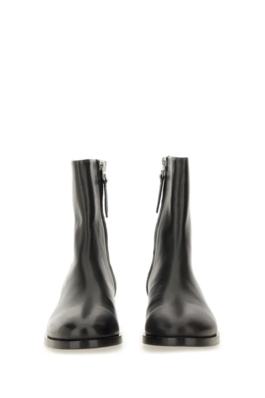 Aeyde women’s black leather ankle boots with sleek minimalist design and functional side zippers