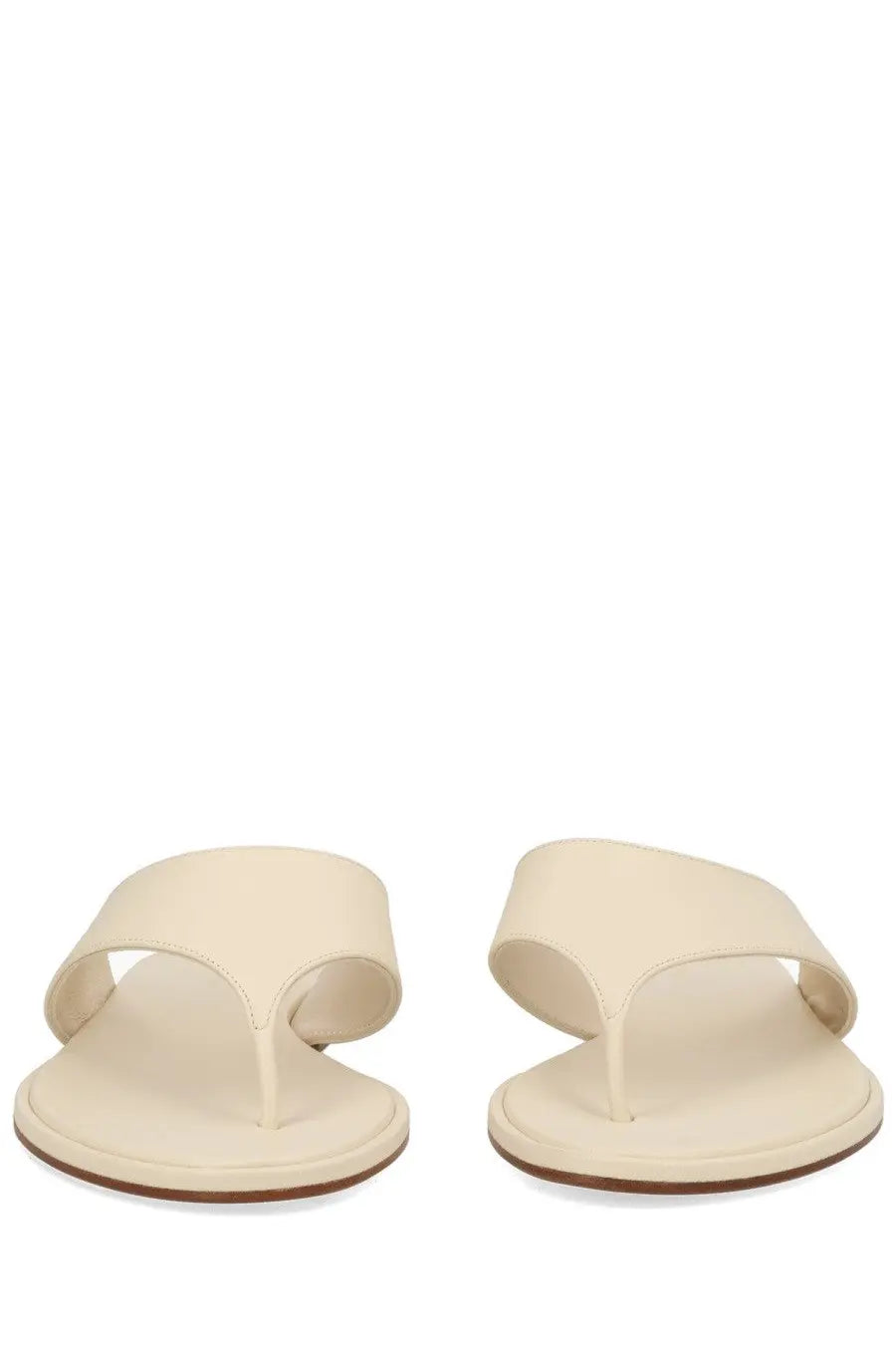 Aeyde women’s cream-colored leather thong sandal with minimalist design and flat sole in white