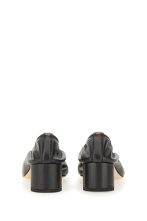 Aeyde women’s pump gemma black leather loafers with matte finish and block heels shown from the back side