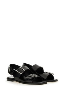 Aeyde women’s black leather sandals with silver-toned buckle straps for stylish summer wear
