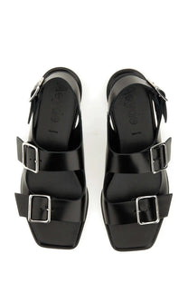 Aeyde women’s black leather sandals with two silver buckle straps and a square toe design
