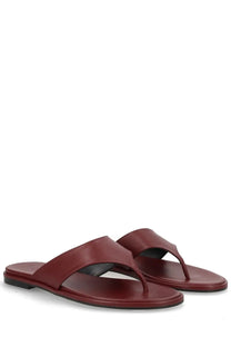 Aeyde women’s burgundy leather thong sandals with minimalist design and black rubber soles