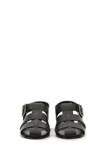Aeyde women’s black leather sandals with woven strap design and silver-toned buckle accents