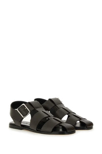 Aeyde women’s black leather sandals with woven straps and silver-toned buckle for stylish summer wear