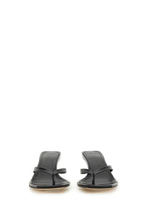 Aeyde women’s Sandalo Wilma black leather thong sandals with minimalist design and subtle insole branding