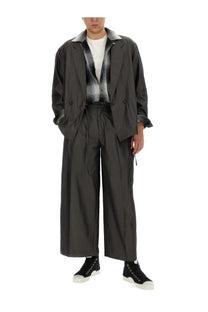 Aïe men’s oversize grey trench coat with subtle sheen structured collar and buttoned front designed for style and warmth