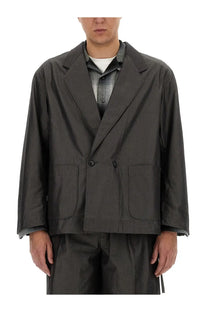 Dark gray double-breasted aïe men’s oversize jacket with sleek modern cut and subtle texture