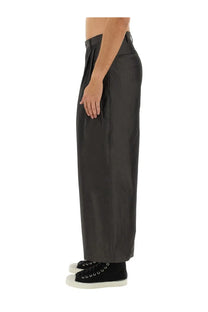 AïE men’s wide fit grey trousers with sleek minimalist design and subtle pleats at the waistband
