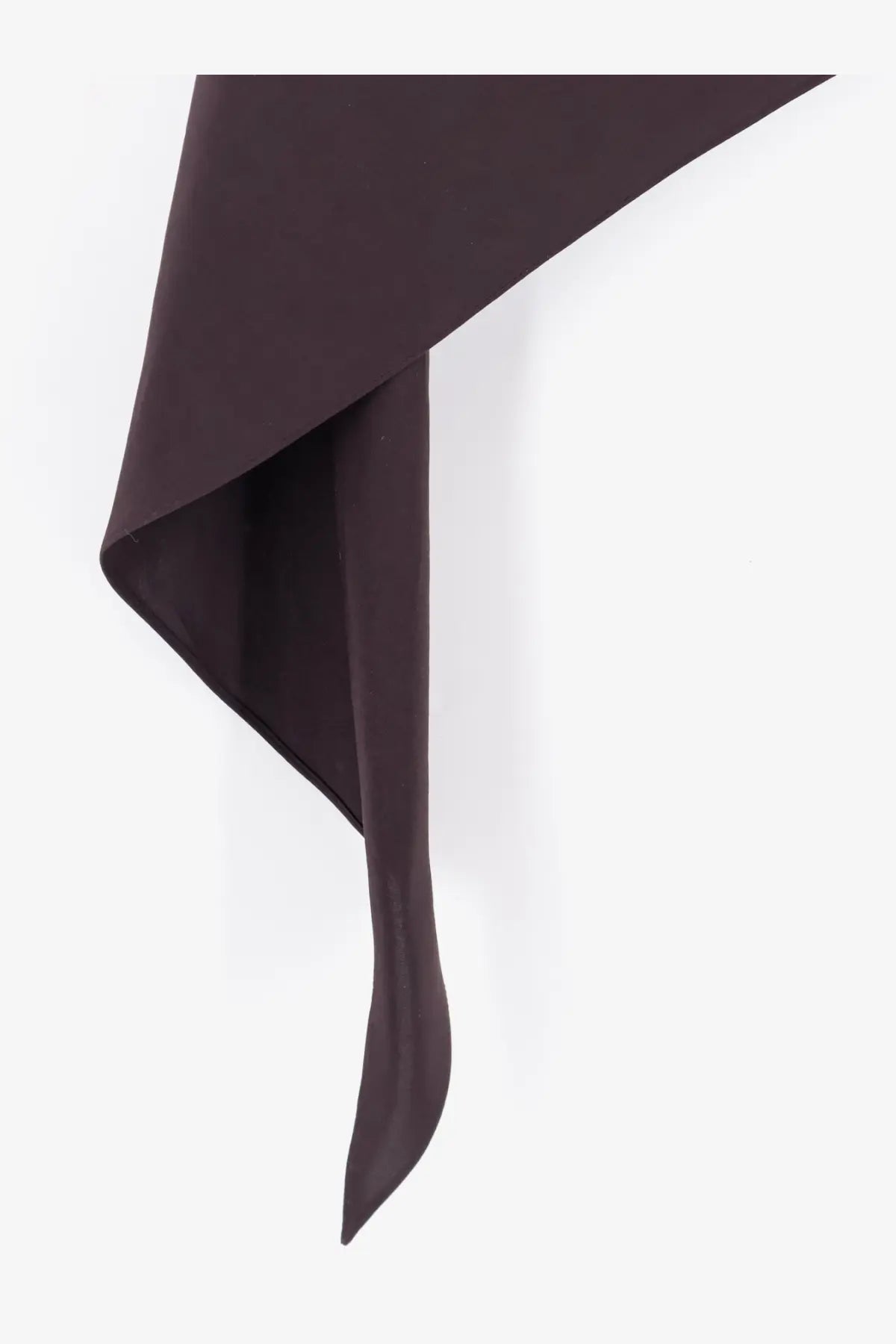 A sleek dark brown fabric scarf with smooth texture and asymmetrical drape paired with alaïa purple skirt