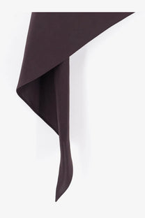 A sleek dark brown fabric scarf with smooth texture and asymmetrical drape paired with alaïa purple skirt