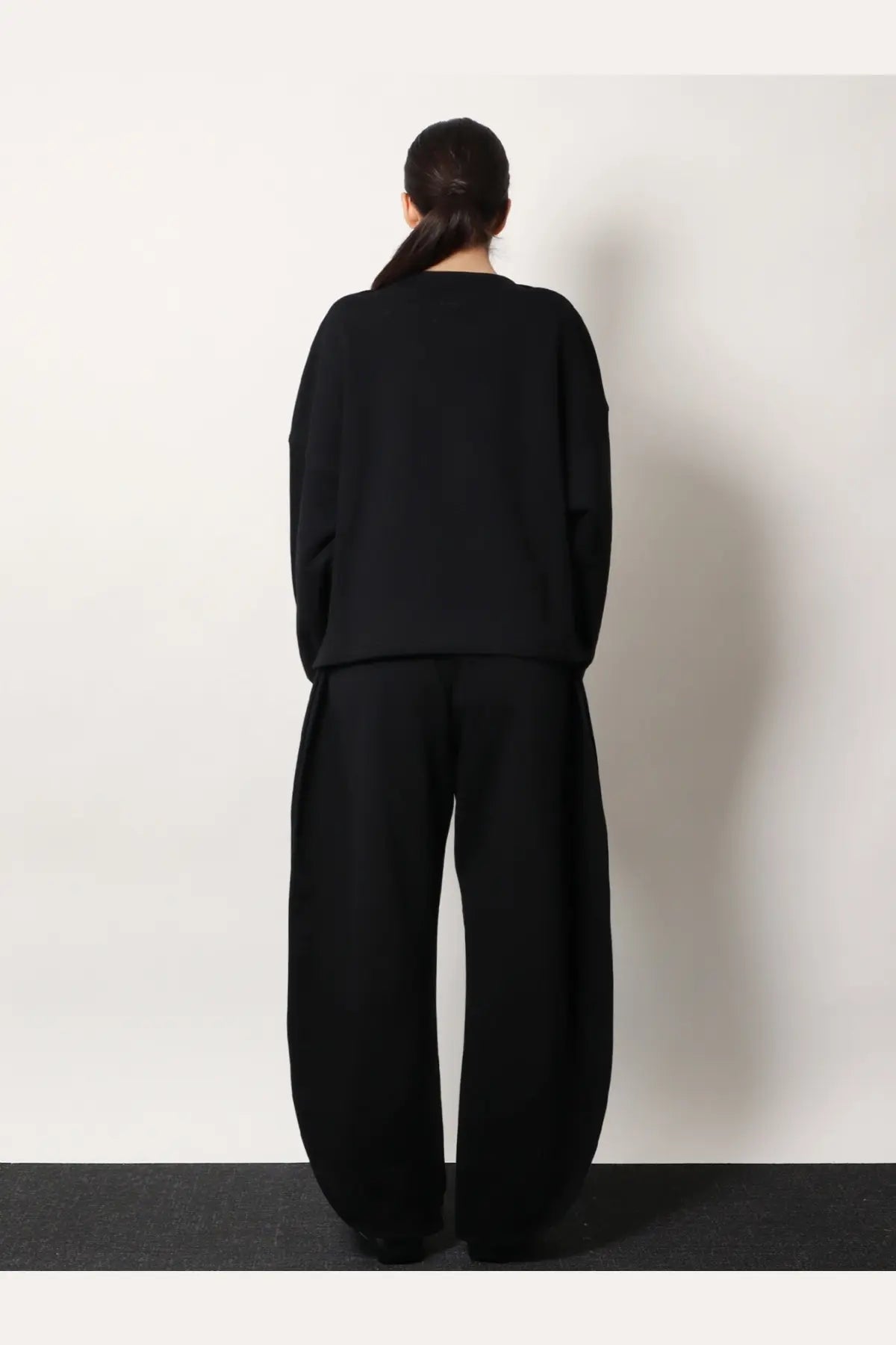 Alaïa women’s boatneck black cotton sweatshirt with oversized knit, relaxed fit, and long sleeves