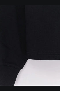 Alaïa women’s boatneck cotton sweatshirt in black with ribbed knit fabric and smooth slightly textured surface