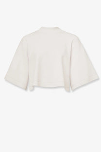 Alaïa women’s cream-colored cropped cotton blend sweater with wide flared sleeves and a soft relaxed fit